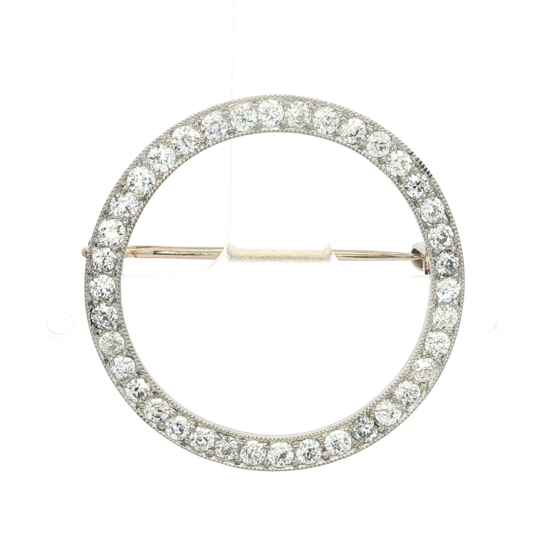 Antique Edwardian Platinum 1.46ctw Old Mine Diamond Brooch Pin: Antique Edwardian Platinum 1.46ctw Old Mine Diamond Brooch Pin This exquisite Antique Edwardian brooch features a stunning open circle design, symbolizing the circle of life. Crafted from solid .820+ 