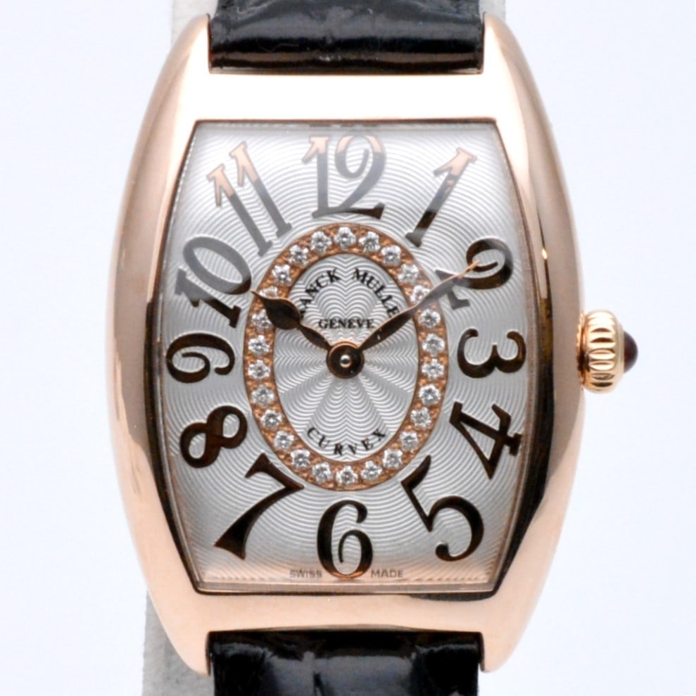 Franck Muller Tonneau Curvex Relief 25mm Ladies Watch: Franck Muller Tonneau Curvex Relief 25mm Ladies Watch This Franck Muller 1752QZRELCD1R 5N Tonneau Curvex Relief ladies' wristwatch features a 25mm case and is crafted with Swiss precision. Designed sp