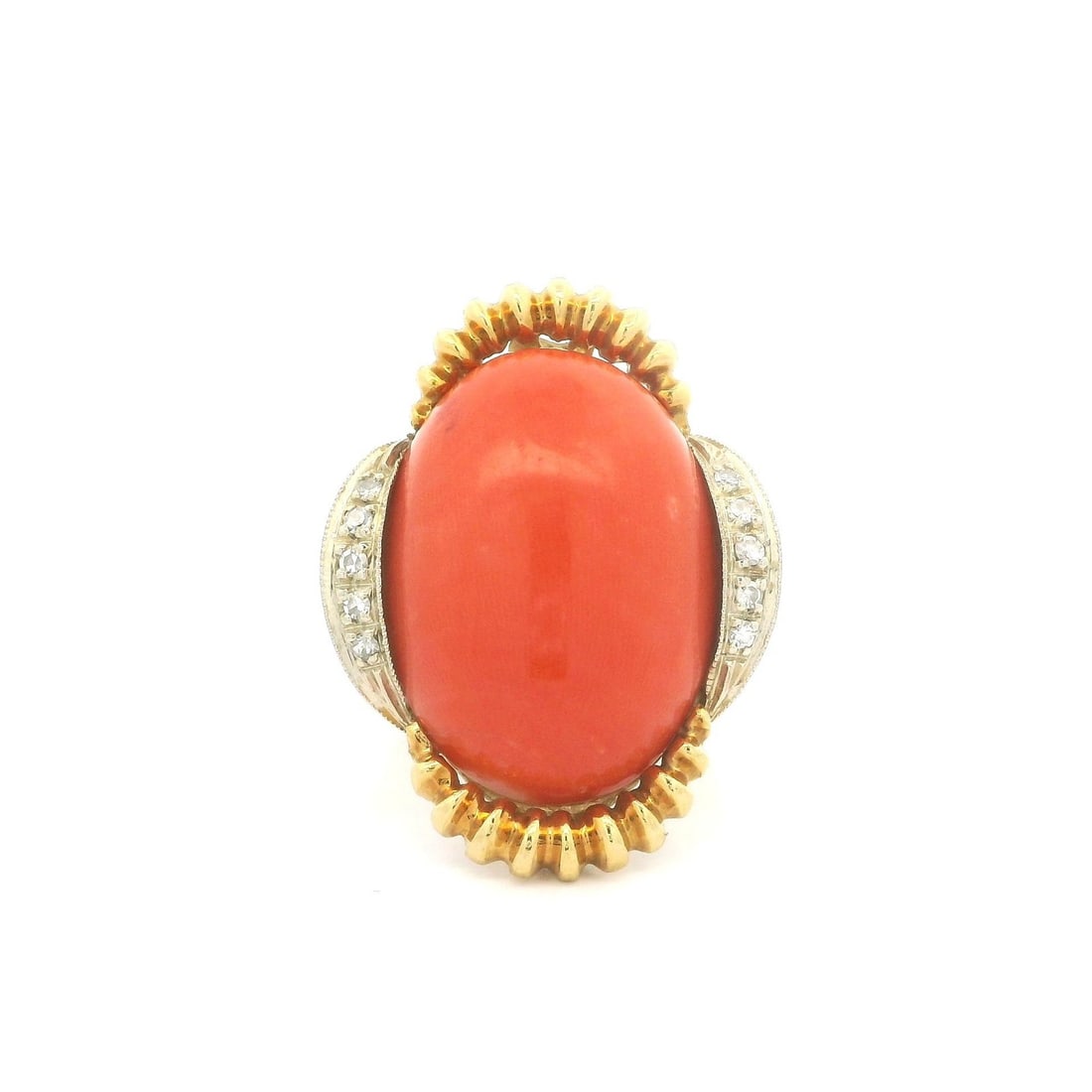 1960s Vintage 18k Yellow Gold Coral Diamond Accent Ring: 1960s Vintage 18k Yellow Gold Coral Diamond Accent Ring This stunning vintage cocktail ring from the 1960s features a large natural coral stone, elegantly complemented by sparkling diamond accents. Th
