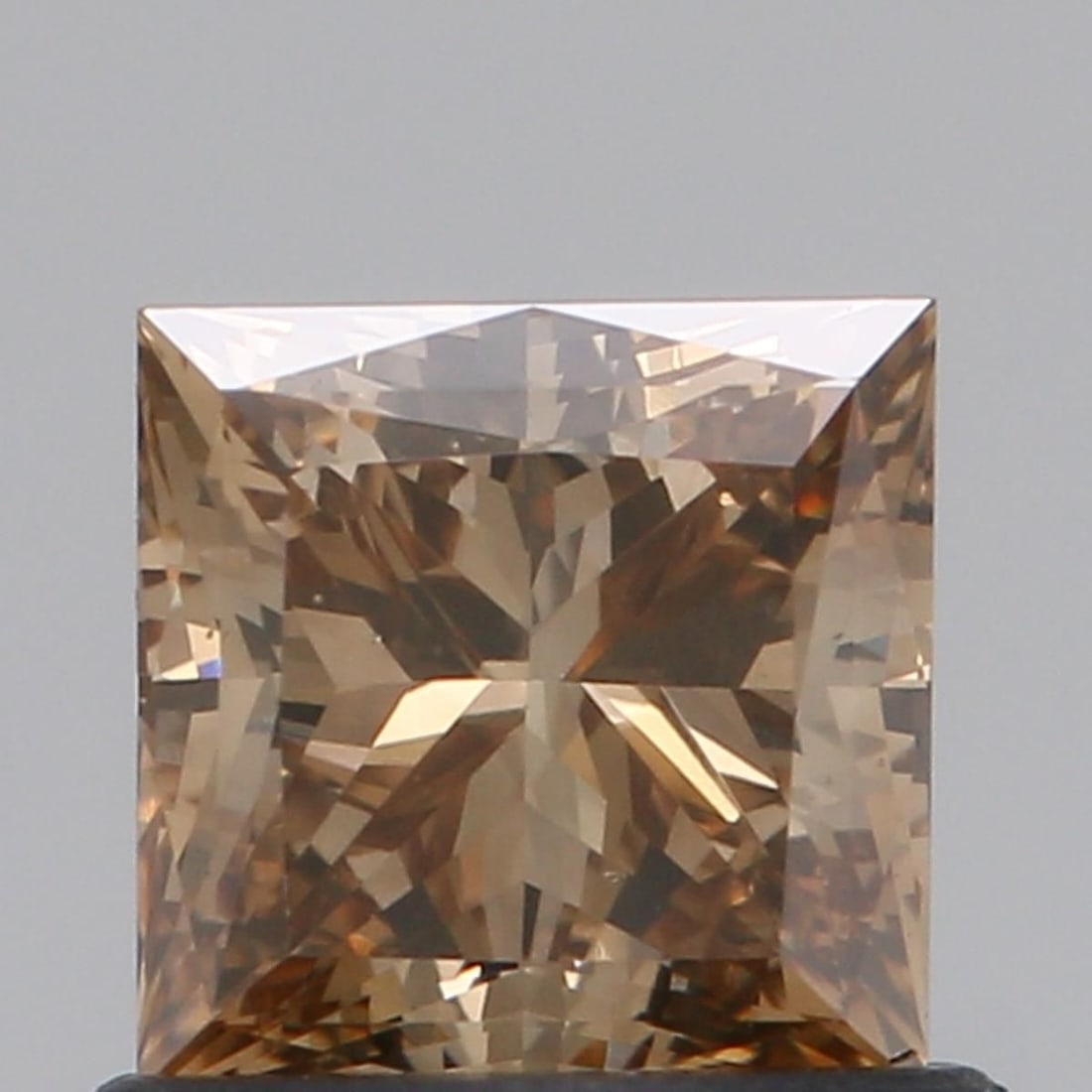 Loose Diamond - PRINCESS 0.79ct Fancy Brown VS1: Loose Diamond - PRINCESS 0.79ct Fancy Brown VS1 Source: Natural Shape: PRINCESS Carats: 0.79 Color: Fancy Brown Certification: NONE Video: