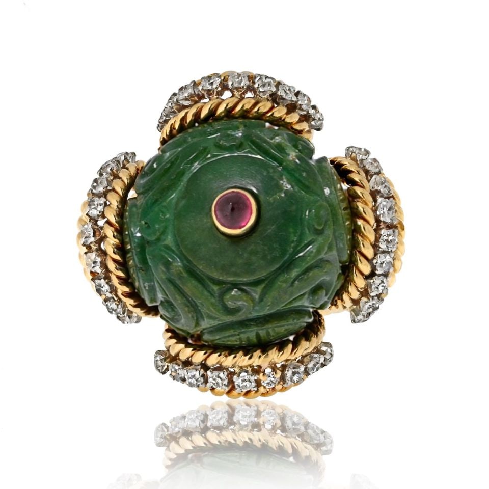 David Webb Vintage Platinum 18K Gold Jade Diamond Ruby Ring: David Webb Vintage Platinum 18K Gold Jade Diamond Ruby Ring Discover the enchanting allure of this Vintage David Webb Platinum & 18K Yellow Gold Carved Jade Diamond and Ruby Ring. This extraordinary p