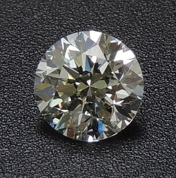 Loose Diamond - ROUND 1.02ct L VVS2: Loose Diamond - ROUND 1.02ct L VVS2 Source: Natural Shape: ROUND Carats: 1.02 Color: L Clarity: VVS2 Certification: IGI The Diamond Depot Guarantee: All items in this auction are guaranteed to be 100%