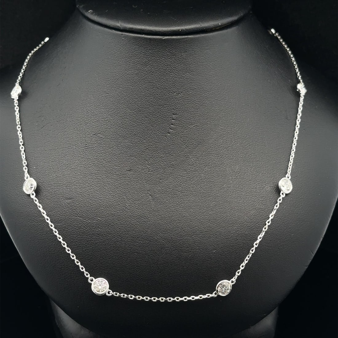 3.04ctw Diamond 14k White Gold Bezel Station Chain Necklace 18 Inch: 3.04ctw Diamond 14k White Gold Bezel Station Chain Necklace 18 Inch This un-used necklace features ten bezel-set round brilliant cut natural diamonds with a total carat weight of 3.04ctw, graded H/I c