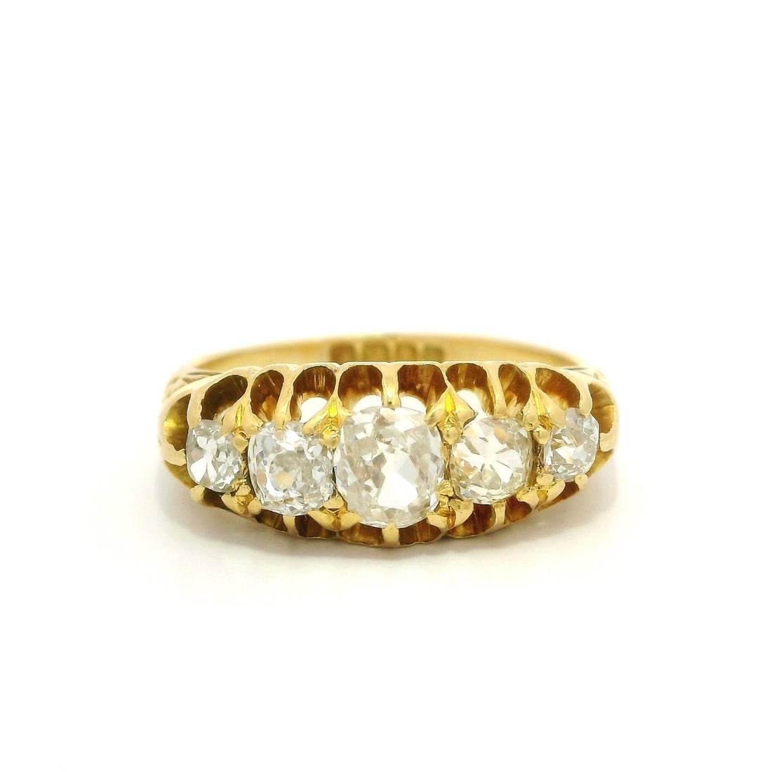 Antique English 18k Gold 1.4ct Old Mine Cut Diamond 5 Stone Ring: Antique English 18k Gold 1.4ct Old Mine Cut Diamond 5 Stone Ring This exquisite antique English band ring features five stunning old mine cut diamonds, totaling approximately 1.40 carats. The diamonds