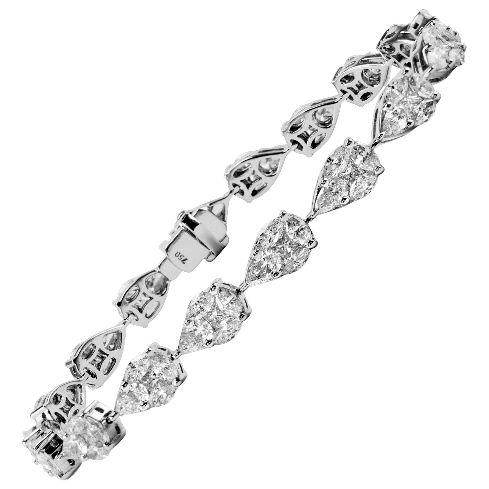 18k White Gold Diamond Bracelet 7.42ct: 18k White Gold Diamond Bracelet 7.42ct Sensational illusion set natural diamond bracelet in 18k white gold. The bracelet features pear, marquise, and princess cut diamonds totaling 7.42 ct, with appro