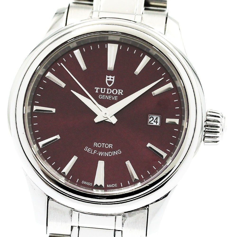 Tudor Style 12100 Automatic Date Women's Wristwatch: Tudor Style 12100 Automatic Date Women's Wristwatch This Tudor Style Date Automatic women's wristwatch features a stainless steel case and bracelet with a bordeaux dial. The watch is equipped with an 