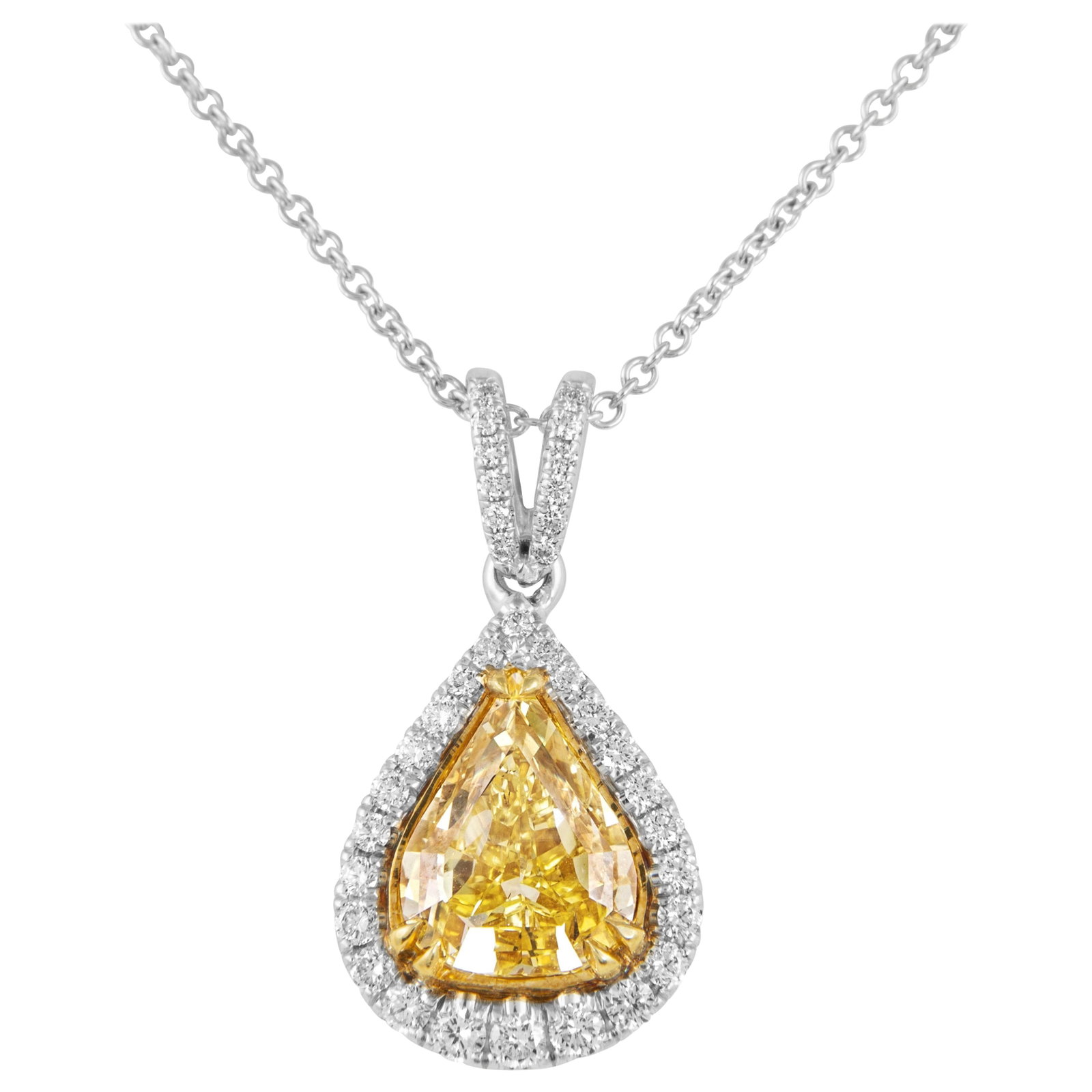 5.70ct Fancy Intense Yellow Diamond Necklace GIA Certified: 5.70ct Fancy Intense Yellow Diamond Necklace GIA Certified This exquisite necklace features a stunning 5.70 ct Fancy Intense Yellow Diamond, elegantly set in a halo design. The centerpiece is compleme