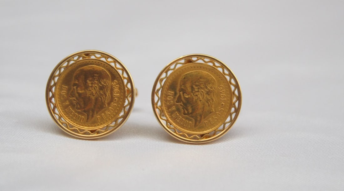 Mexican Peso Coin Cufflinks in 14K Frames Pair: Mexican Peso Coin Cufflinks in 14K Frames Pair This pair of cufflinks features authentic 22K gold Mexican pesos coins set within elegant 14K gold frames. The cufflinks showcase detailed craftsmanship 