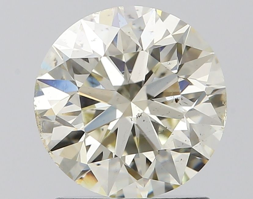 Loose Diamond - ROUND 1.5ct K SI1: Loose Diamond - ROUND 1.5ct K SI1 Source: Natural Shape: ROUND Carats: 1.5 Color: K Clarity: SI1 Certification: IGI Video: