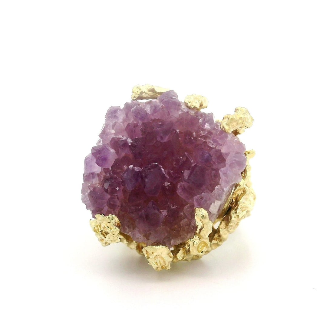 Natural Amethyst Crystal Cocktail Ring in Solid Yellow Gold: Natural Amethyst Crystal Cocktail Ring in Solid Yellow Gold Make a bold statement with this stunning cocktail ring featuring a natural raw uncut amethyst crystal. The centerpiece is a genuine purple a