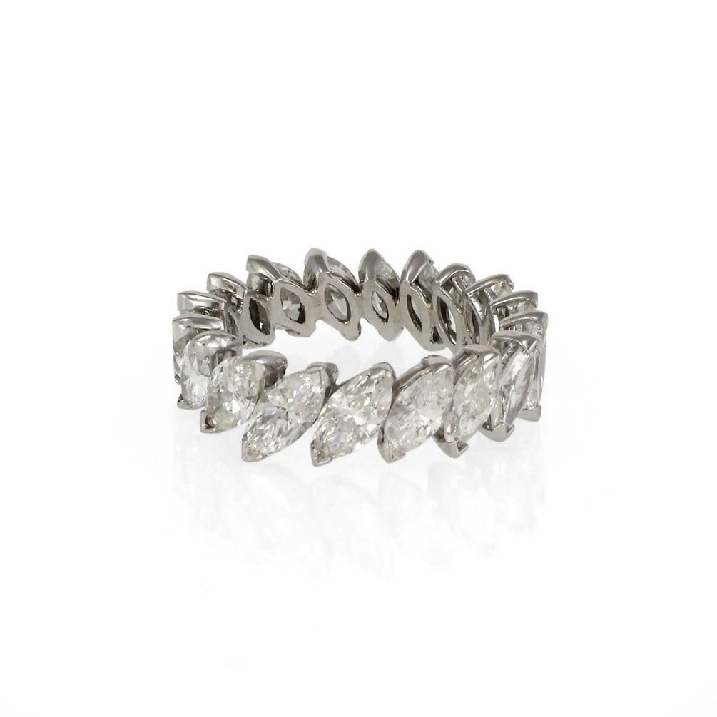 Platinum Marquise Diamond Eternity Ring 4 Carats Size 4.5: Platinum Marquise Diamond Eternity Ring 4 Carats Size 4.5 This stunning marquise diamond eternity ring features a polished platinum band that is 6mm wide. The ring showcases a full circle of sparkling