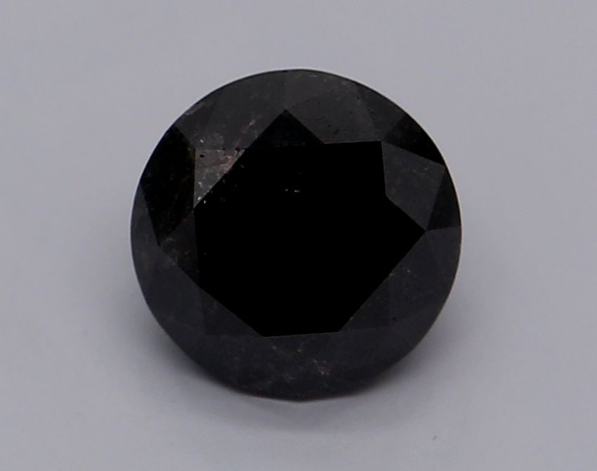 Loose Diamond - ROUND 1.24ct Fancy Black: Loose Diamond - ROUND 1.24ct Fancy Black Source: Natural Shape: ROUND Carats: 1.24 Color: Fancy Black Certification: IGI Video: