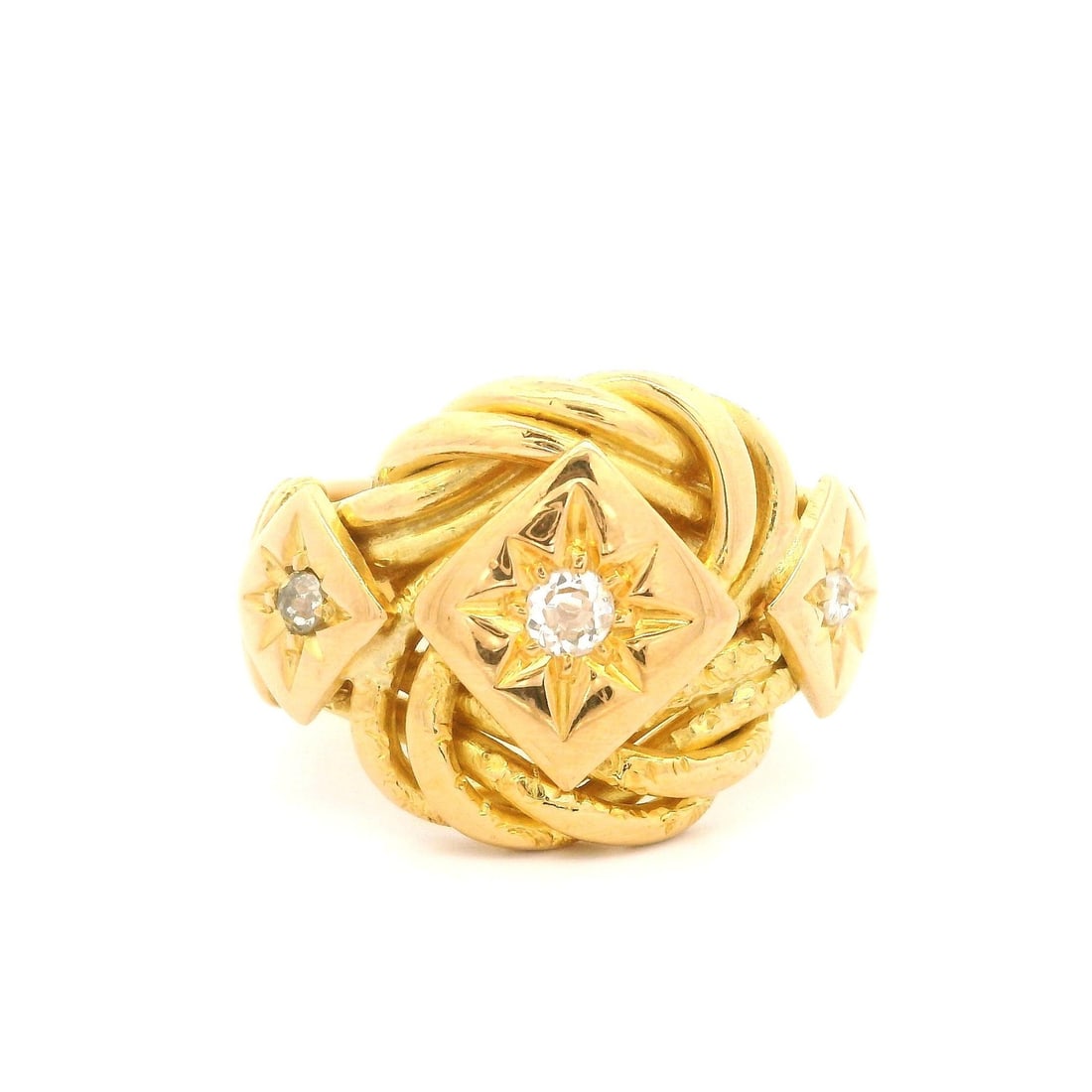 Victorian 18k Yellow Gold Diamond Star Pave Ring: Victorian 18k Yellow Gold Diamond Star Pave Ring This antique Victorian wide band ring is crafted from solid 18k yellow gold and features a twisted design. The centerpiece of the ring is three old min