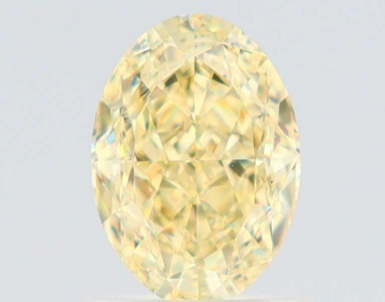 Loose Diamond - OVAL 1.16ct Fancy Yellow VVS2: Loose Diamond - OVAL 1.16ct Fancy Yellow VVS2 Source: Natural Shape: OVAL Carats: 1.16 Color: Fancy Yellow Certification: GIA The Diamond Depot Guarantee: All items in this auction are guaranteed to b