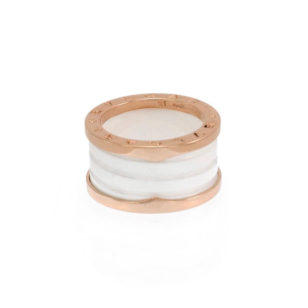 Bulgari B.zero1 18k Rose Gold White Ceramic Ring Size 53: Bulgari B.zero1 18k Rose Gold White Ceramic Ring Size 53 This authentic Bulgari B.zero1 ring is a stunning piece from the renowned Bvlgari collection. It features a luxurious band crafted from 18k ros