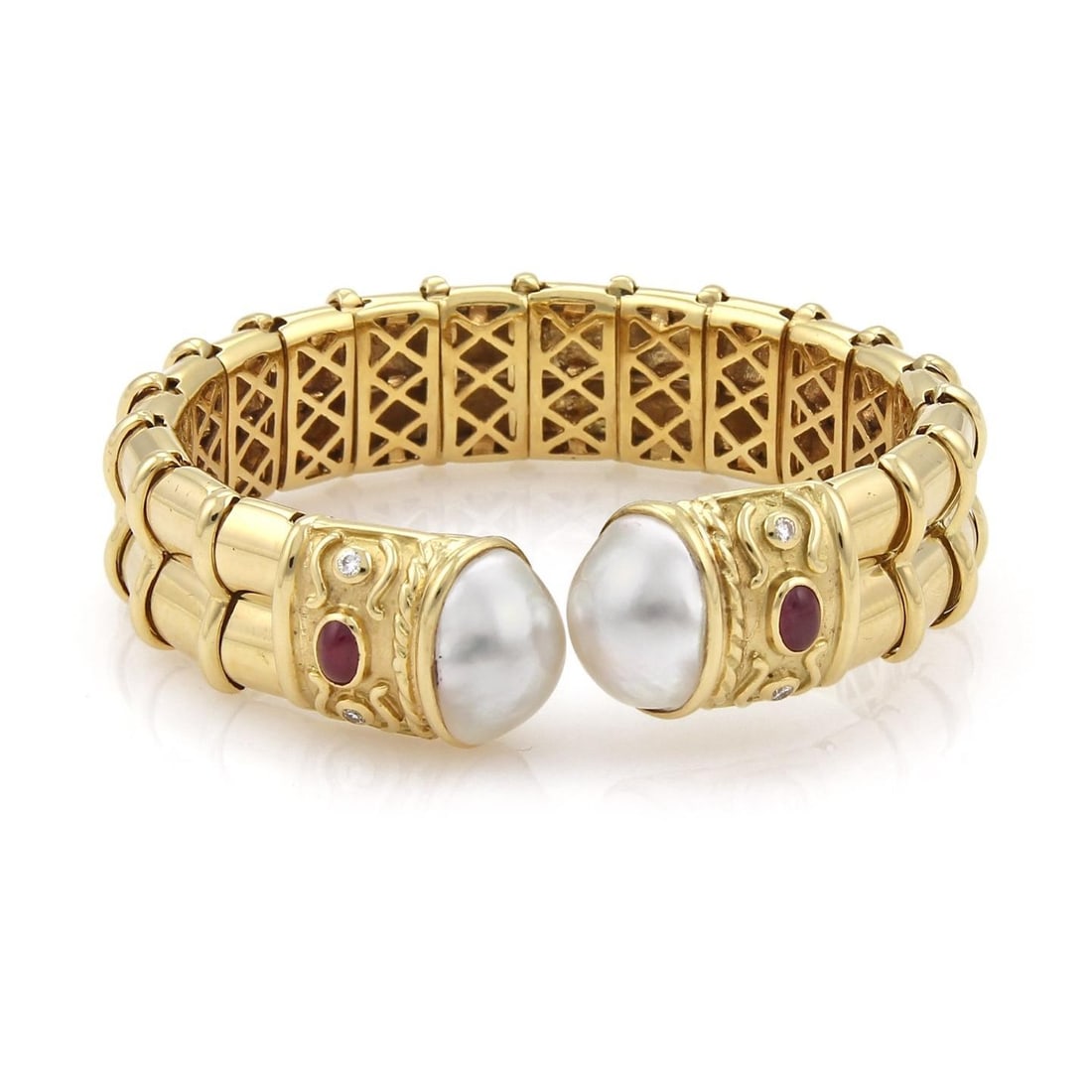 18k Yellow Gold Cuff Bracelet with Diamonds Rubies and White Mabe Pearls: 18k Yellow Gold Cuff Bracelet with Diamonds Rubies and White Mabe Pearls This pre-owned bracelet is crafted from 18k yellow gold with a polished finish. It features an open front design, each end ador