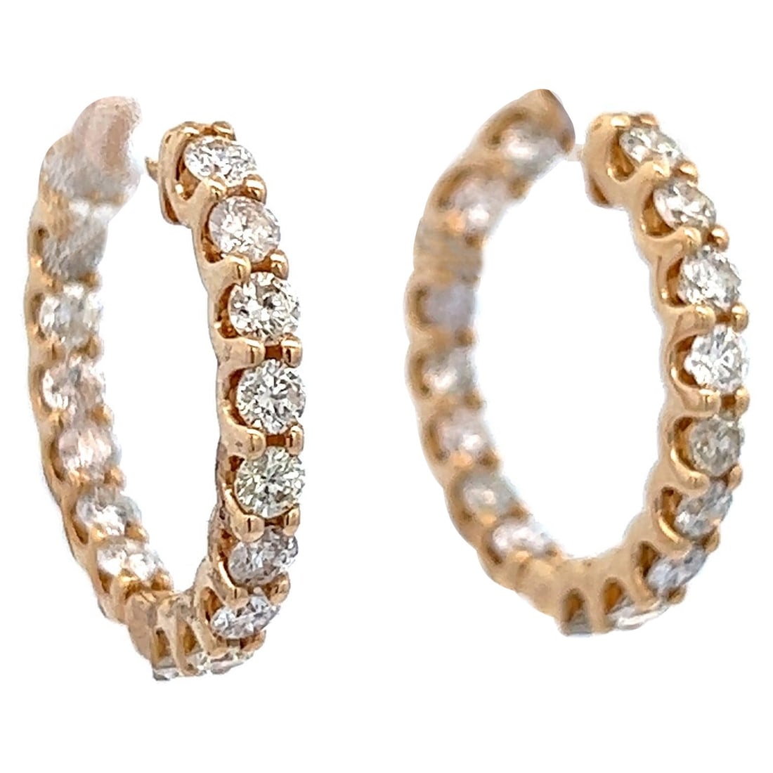 Contemporary 1.11ct Round Diamond Hoop Earrings in 14k Yellow Gold: Contemporary 1.11ct Round Diamond Hoop Earrings in 14k Yellow Gold These exquisite contemporary hoop earrings feature 84 round brilliant diamonds, totaling 1.11 carats. Crafted from 14k yellow gold, t