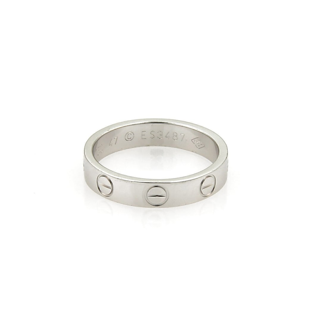 Cartier Mini Love ring in 18k white gold 3.5mm size 4.5: Cartier Mini Love ring in 18k white gold 3.5mm size 4.5 This Cartier Mini Love band ring is crafted in 18k white gold and features the signature screw motif design from the Love collection. It has a s