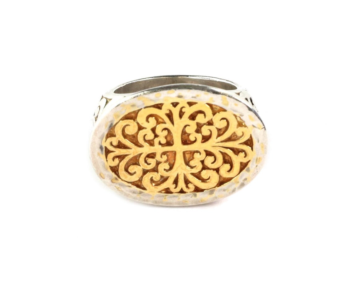 Lois Hill Sterling Silver Ring with Gold Plated Scroll Design: Lois Hill Sterling Silver Ring with Gold Plated Scroll Design This stunning ring showcases the artistry of Lois Hill, featuring a beautifully crafted oval top adorned with a deep carved scroll design.