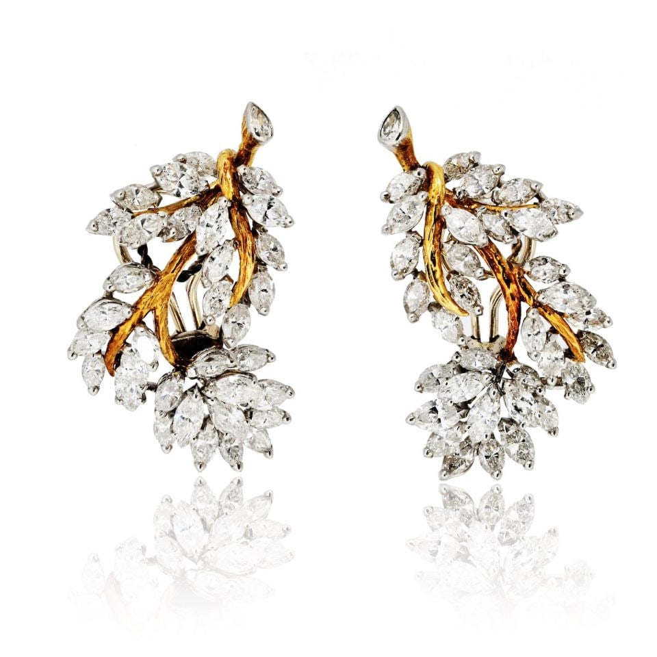 Circa 1970's Platinum 18K Yellow Gold 10 Carat Diamond Foliage Earrings: Circa 1970's Platinum 18K Yellow Gold 10 Carat Diamond Foliage Earrings Experience the allure of vintage glamour with these circa 1970's earrings, expertly crafted from platinum and 18K yellow gold. T