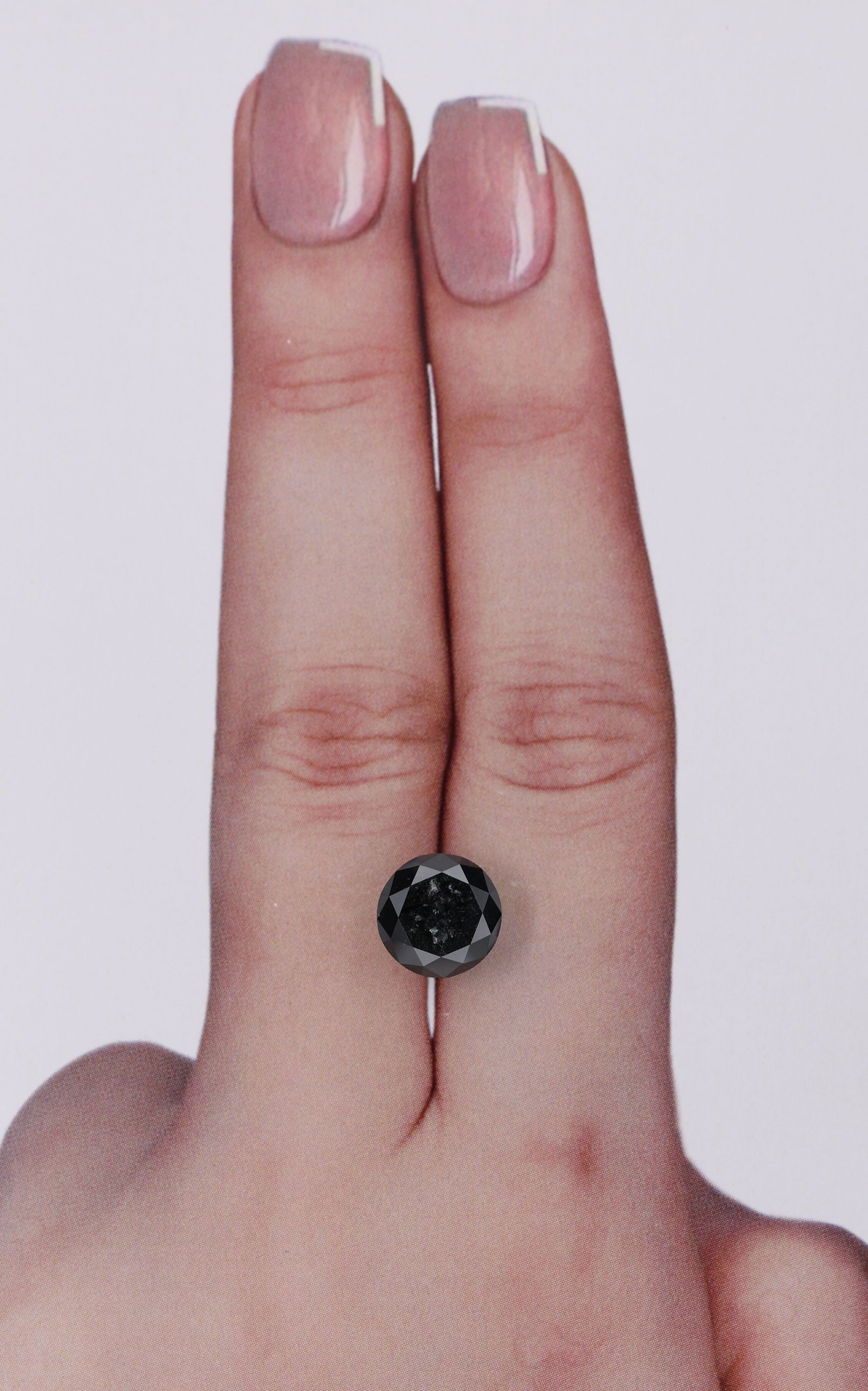 Loose Diamond - ROUND 2.32ct Fancy Black VVS2: Loose Diamond - ROUND 2.32ct Fancy Black VVS2 Source: Natural Shape: ROUND Carats: 2.32 Color: Fancy Black Certification: NONE Video: