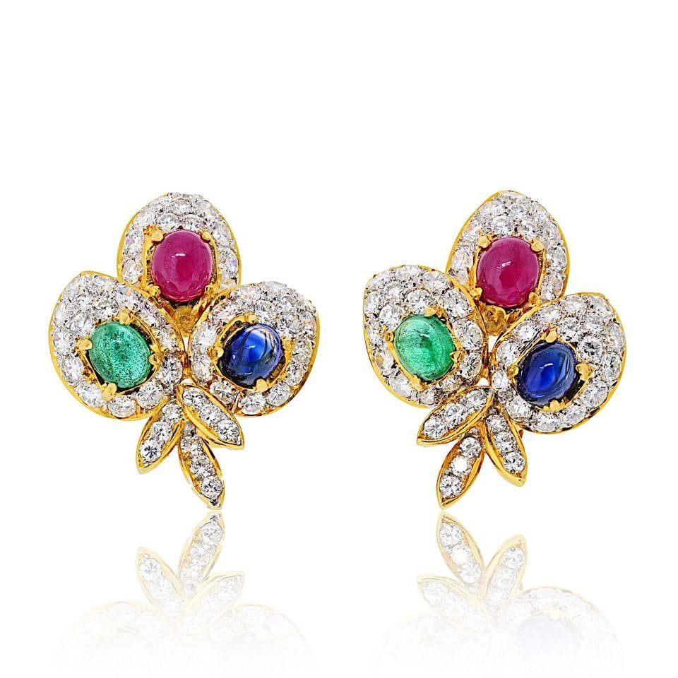 18K Yellow Gold Estate Earrings with Diamonds and Gemstones: 18K Yellow Gold Estate Earrings with Diamonds and Gemstones These exquisite estate earrings are a stunning blend of luxury and playfulness, crafted in 18K yellow gold. Each earring features a unique t