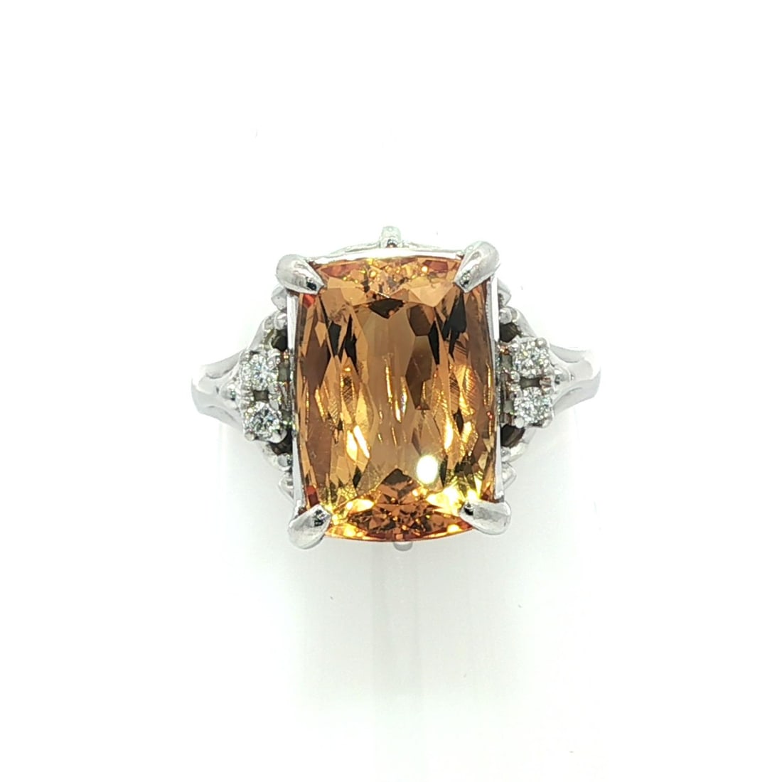 Vintage Platinum 5.52ctw Long Cushion Topaz Ring with Diamonds: Vintage Platinum 5.52ctw Long Cushion Topaz Ring with Diamonds This exquisite vintage ring showcases a dazzling natural golden topaz in an elongated long cushion cut, measuring 12x8.2mm and weighing 5