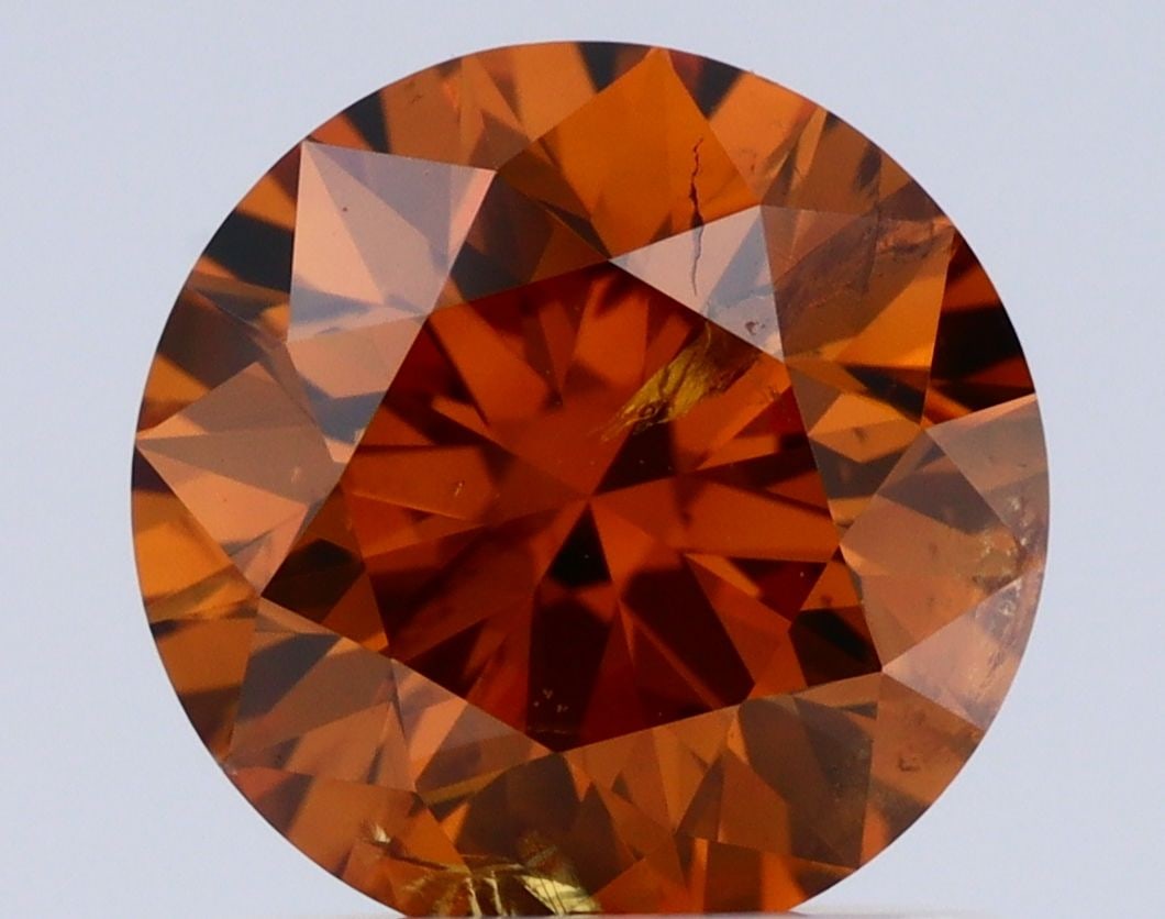 Loose Diamond - ROUND 1.02ct Fancy Deep Yellowish Brown I2: Loose Diamond - ROUND 1.02ct Fancy Deep Yellowish Brown I2 Source: Natural Shape: ROUND Carats: 1.02 Color: Fancy Deep Yellowish Brown Certification: GIA Video: