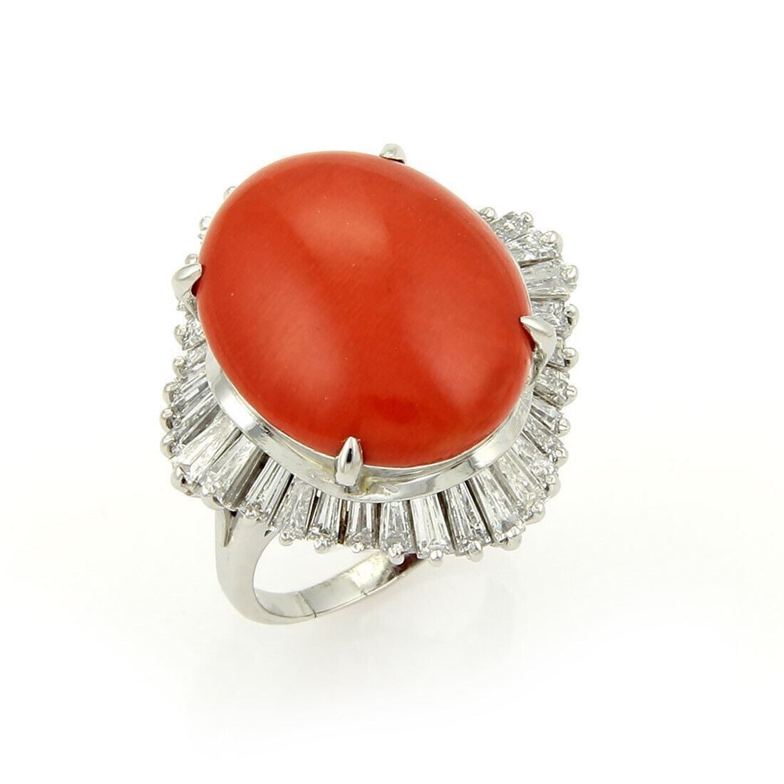 Vintage PT900 Coral and Baguette Diamond Cocktail Ring Size 7.75: Vintage PT900 Coral and Baguette Diamond Cocktail Ring Size 7.75 This vintage estate cocktail ring is crafted in platinum and features a coral accent centerpiece with baguette diamonds. The elongated 