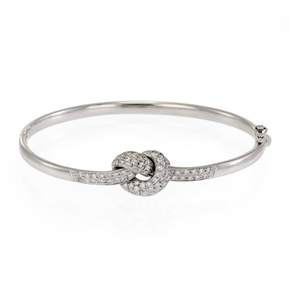 Roberto Coin Vintage Love Knot Bangle 18k White Gold Pave Diamond Bracelet: Roberto Coin Vintage Love Knot Bangle 18k White Gold Pave Diamond Bracelet This exquisite vintage bangle bracelet from Roberto Coin is a stunning piece crafted in 18k white gold. It features a high-po