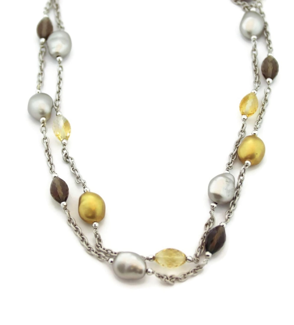 Roberto Coin 18k Gold Double Strand Necklace with Diamonds and Gemstones: Roberto Coin 18k Gold Double Strand Necklace with Diamonds and Gemstones This stunning double strand necklace from Roberto Coin showcases exquisite craftsmanship in 18k white and yellow gold. The neck