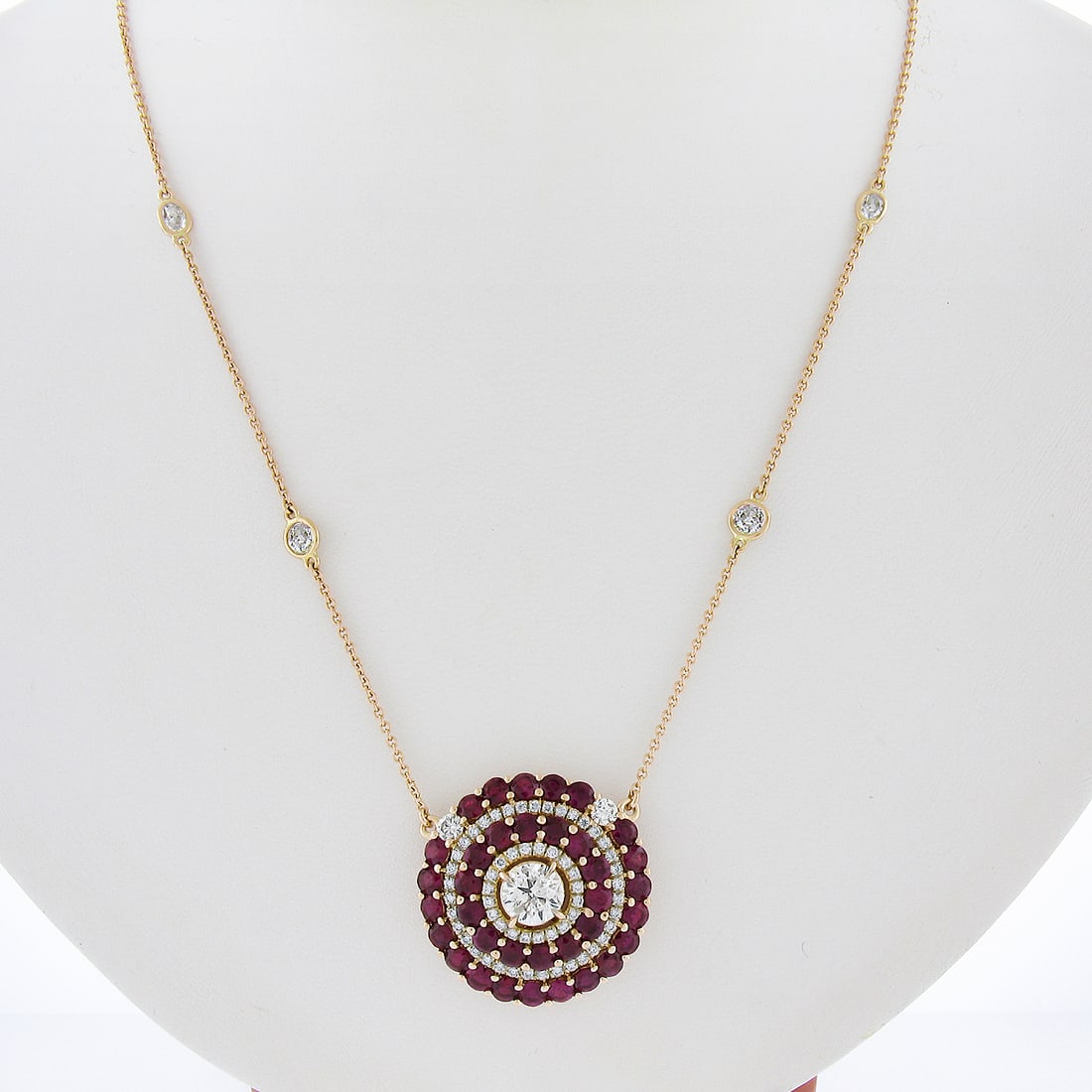 18k Rose Gold 7.32ctw Ruby Diamond Round Pendant Necklace 19.5": 18k Rose Gold 7.32ctw Ruby Diamond Round Pendant Necklace 19.5" This exquisite necklace features a stunning 18k rose gold design, showcasing a vibrant round pendant adorned with 35 natural rubies and 