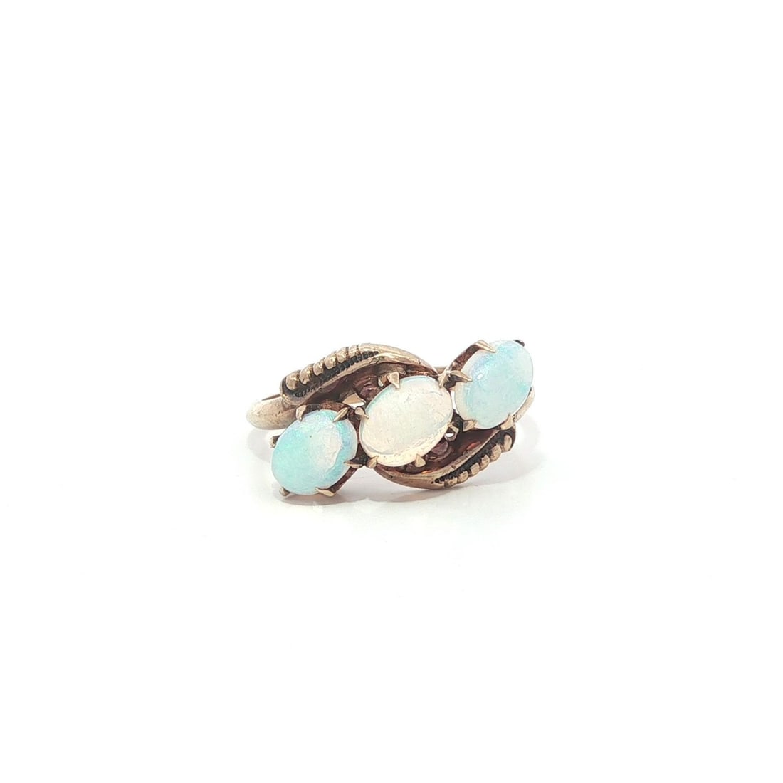 Victorian Era 9-10k Rosy Yellow Gold Ring With Three Natural Opal Cabochons: Victorian Era 9-10k Rosy Yellow Gold Ring With Three Natural Opal Cabochons This antique Victorian ring features three natural oval cabochon opals prong set in solid rosy yellow gold. The opals displa
