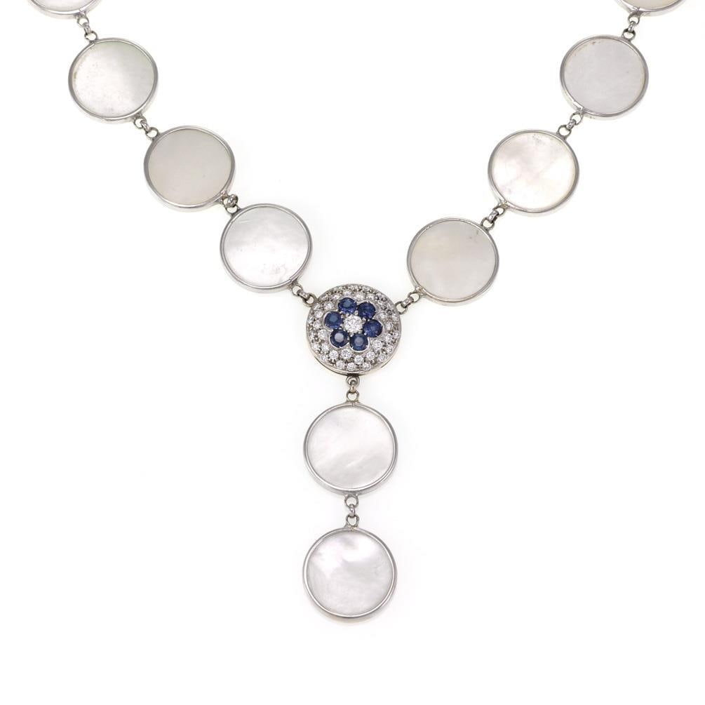 Estate 1.55ct Diamond Sapphire Lariat Necklace 18k White Gold: Estate 1.55ct Diamond Sapphire Lariat Necklace 18k White Gold This exquisite Estate necklace features a beautiful combination of 18k white gold, shimmering mother of pearl, diamonds, and sapphires. Th