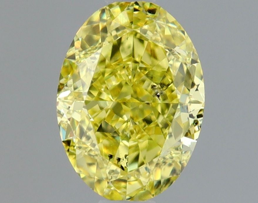 Loose Diamond - OVAL 0.76ct Fancy Intense Yellow SI2: Loose Diamond - OVAL 0.76ct Fancy Intense Yellow SI2 Source: Natural Shape: OVAL Carats: 0.76 Color: Fancy Intense Yellow Certification: GIA Video: