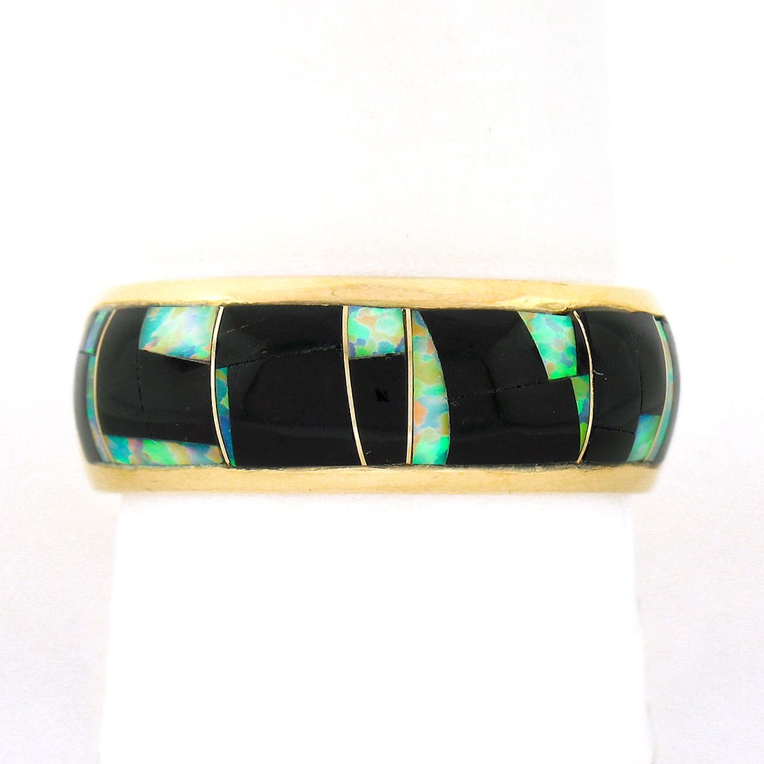14K Yellow Gold Mosaic Opal Black Onyx Wide Band Ring Size 11: 14K Yellow Gold Mosaic Opal Black Onyx Wide Band Ring Size 11 This striking band ring is crafted from solid 14K yellow gold and features a stunning mosaic design on its domed top, showcasing natural o
