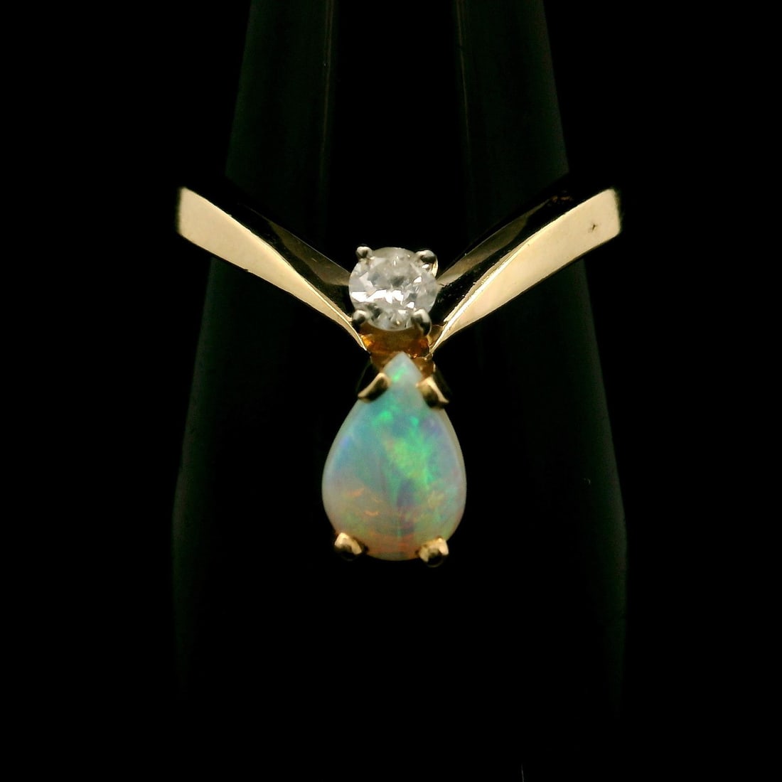 14k Yellow Gold Opal Diamond Chevron Tiara Style Band Ring: 14k Yellow Gold Opal Diamond Chevron Tiara Style Band Ring This exquisite 14k Yellow Gold Opal & Diamond Chevron Tiara Style Stack Band Ring features a stunning design perfect for any jewelry collecti