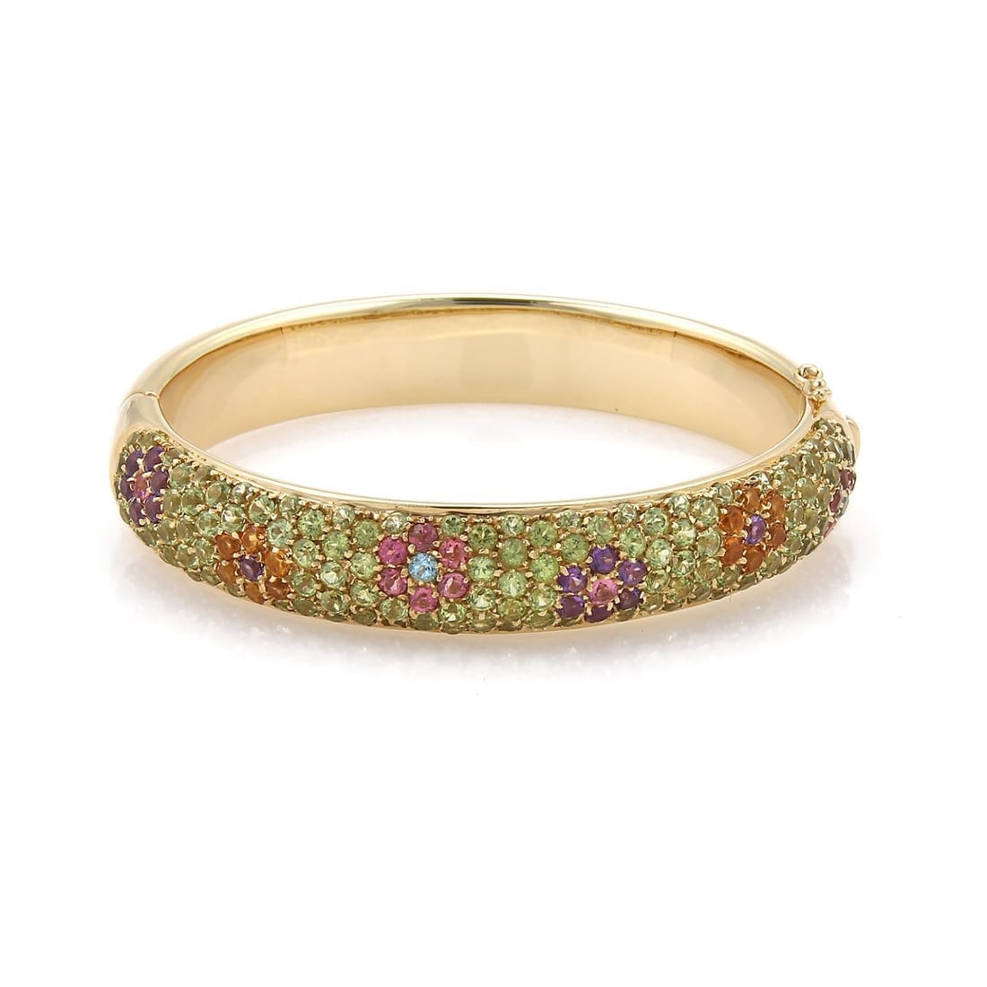 18k Yellow Gold Floral Tourmaline Bangle Bracelet Estate Piece: 18k Yellow Gold Floral Tourmaline Bangle Bracelet Estate Piece This exquisite bangle bracelet features a stunning floral design crafted from 18k yellow gold with a high polished finish. Its dome shape