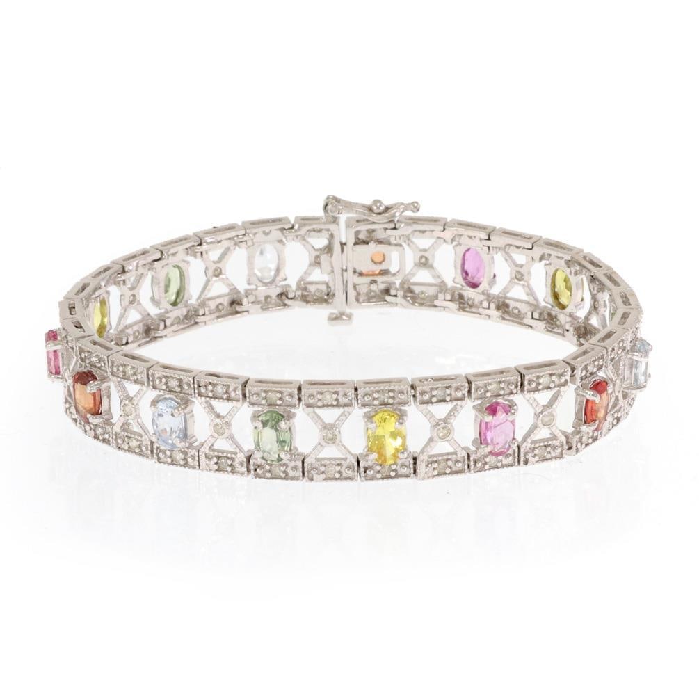 14k White Gold Sapphire Diamond Link Bracelet: 14k White Gold Sapphire Diamond Link Bracelet This elegant wide bracelet is crafted from 14k white gold and features an open design with X-shaped hourglass links adorned with diamonds along a fine bea