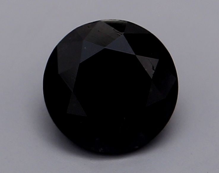 Loose Diamond - ROUND 0.61ct Fancy Black VVS2: Loose Diamond - ROUND 0.61ct Fancy Black VVS2 Source: Natural Shape: ROUND Carats: 0.61 Color: Fancy Black Certification: GIA Video: