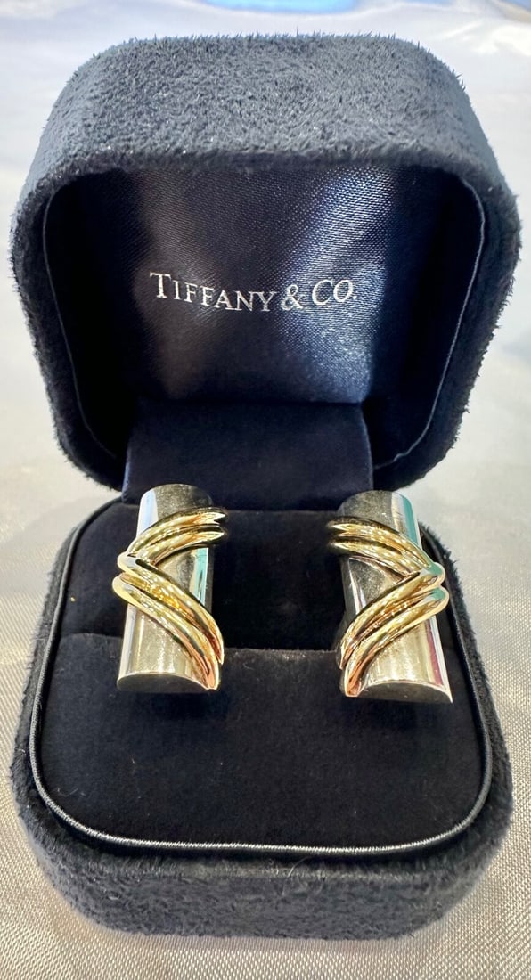 Tiffany & Co 18K Gold Sterling Silver Cufflinks with Original Box: Tiffany & Co 18K Gold Sterling Silver Cufflinks with Original Box Elevate your formal attire with this exquisite pair of cufflinks from Tiffany & Co. Crafted with a combination of 18k yellow gold and 