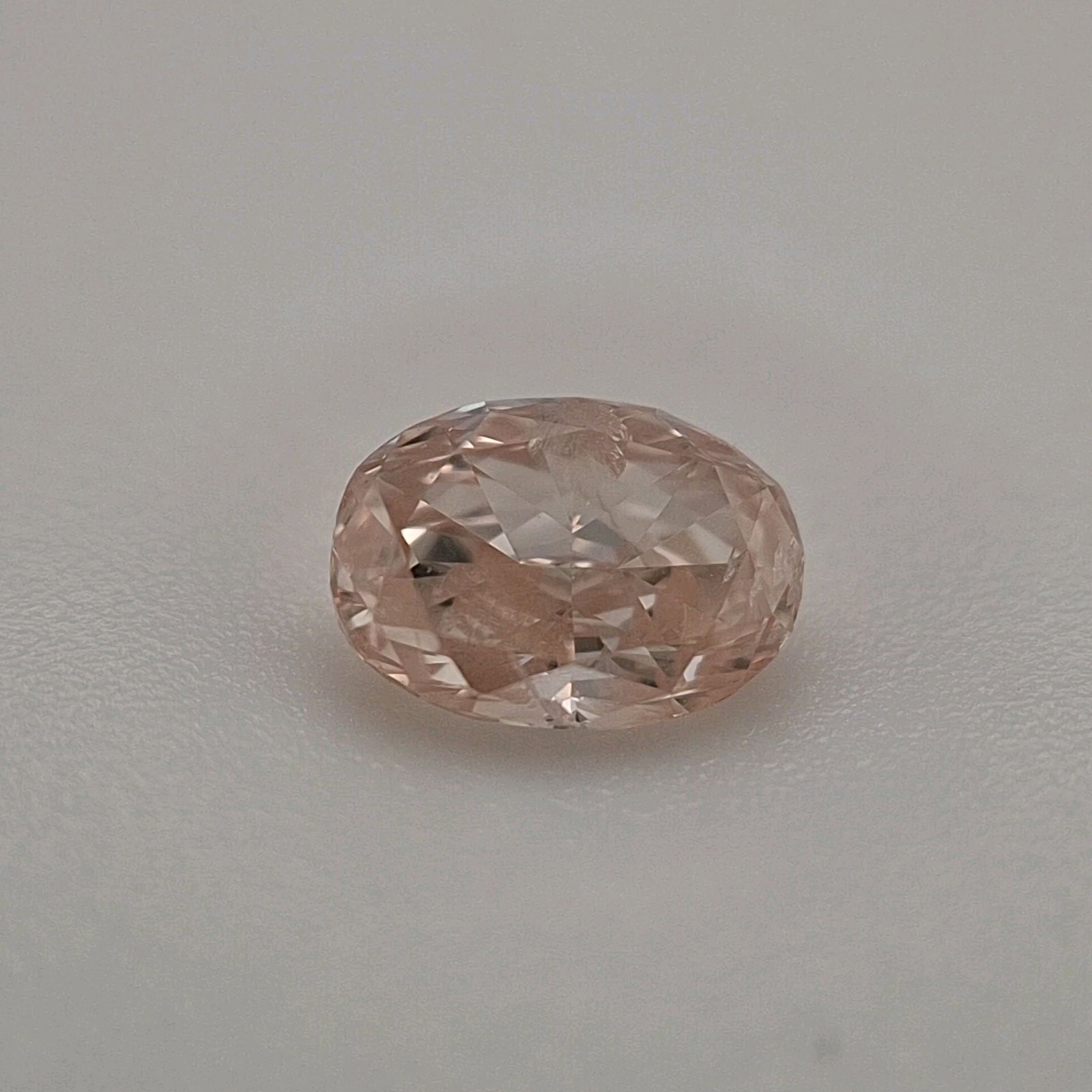 Loose Diamond - OVAL 0.29ct Fancy Pinkish Brown I2: Loose Diamond - OVAL 0.29ct Fancy Pinkish Brown I2 Source: Natural Shape: OVAL Carats: 0.29 Color: Fancy Pinkish Brown Certification: EGL The Diamond Depot Guarantee: All items in this auction are gua