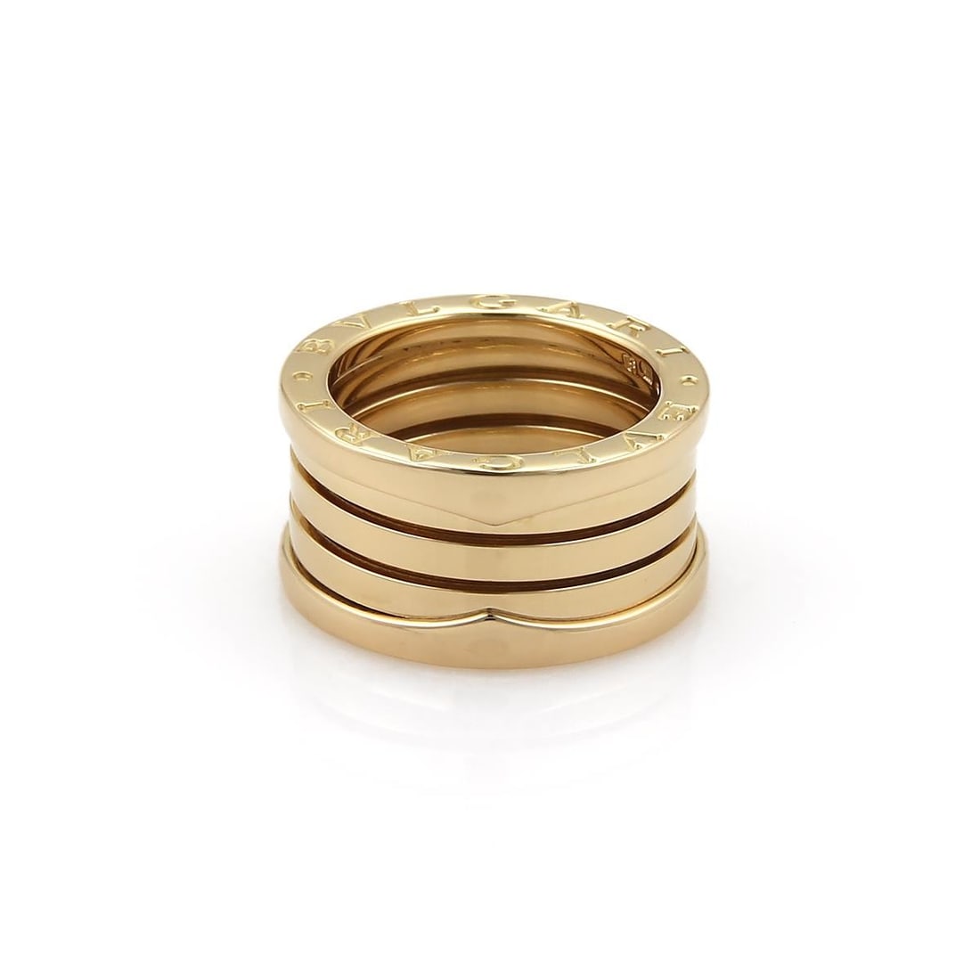Bvlgari B Zero-1 18k Yellow Gold Flex Band Ring EU 51-US 5.25: Bvlgari B Zero-1 18k Yellow Gold Flex Band Ring EU 51-US 5.25 Discover timeless elegance with this authentic Bvlgari B Zero-1 band ring, exquisitely crafted from 18k yellow gold. This stunning piece s