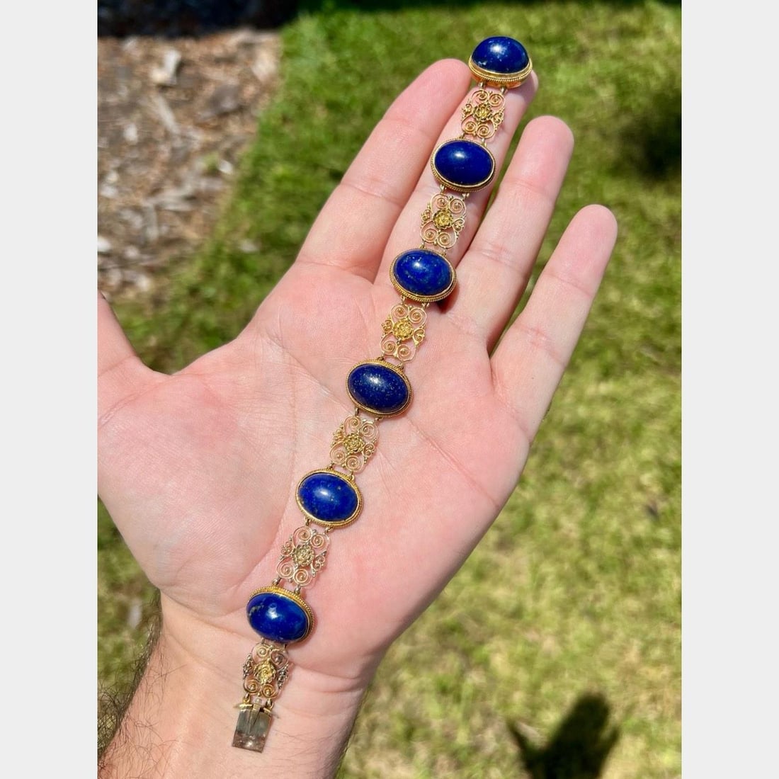 Antique 10K Yellow Gold Lapis Lazuli 7.5 Inch Bracelet: Antique 10K Yellow Gold Lapis Lazuli 7.5 Inch Bracelet This stunning antique bracelet is crafted from 10K yellow gold and features beautiful lapis lazuli cabochons. The bracelet weighs 20.5 grams and 