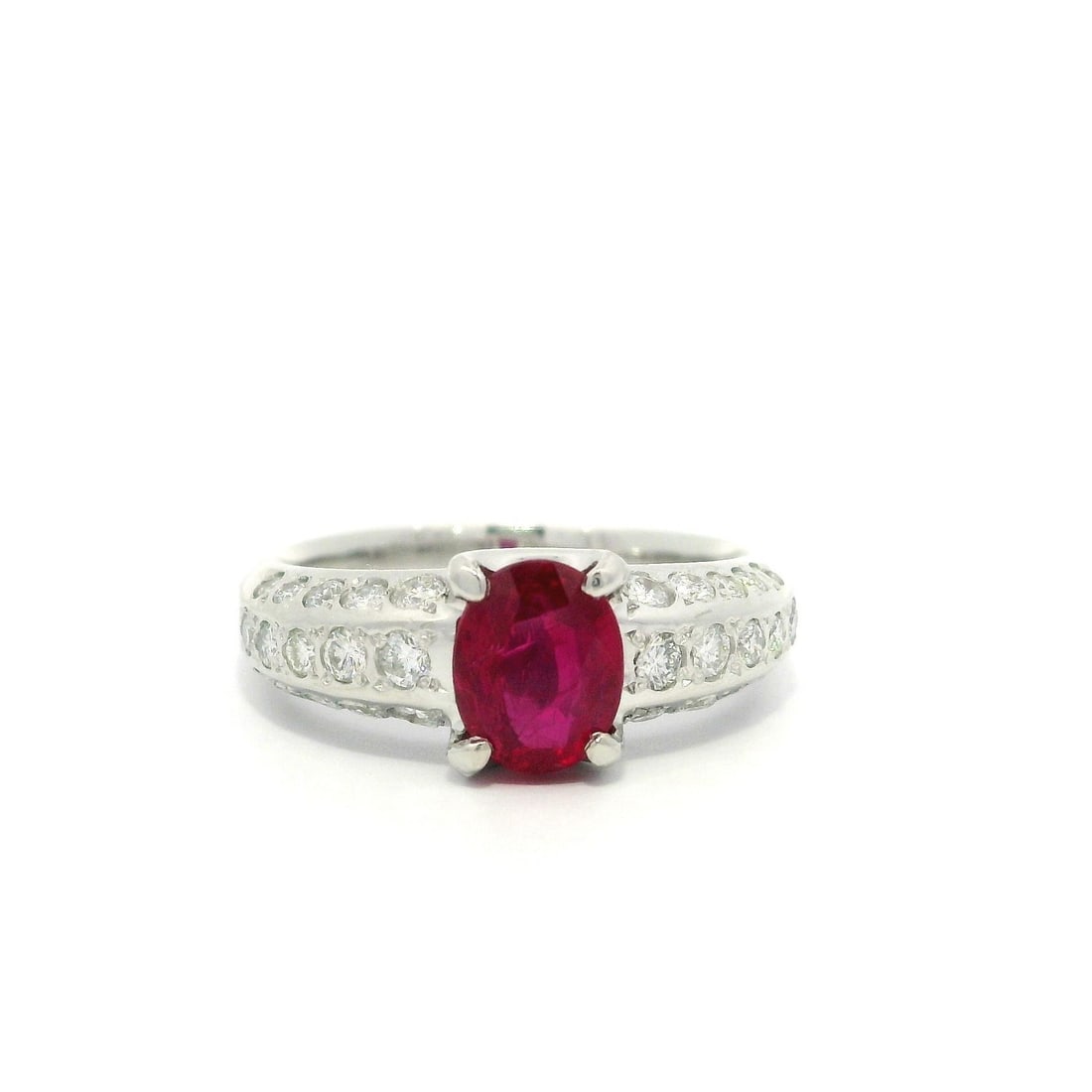 Platinum GIA Certified 1.56ctw Oval No Heat Ruby Diamond Cocktail Ring: Platinum GIA Certified 1.56ctw Oval No Heat Ruby Diamond Cocktail Ring This stunning cocktail ring is crafted from solid platinum and features a breathtaking natural ruby and diamond combination. The 