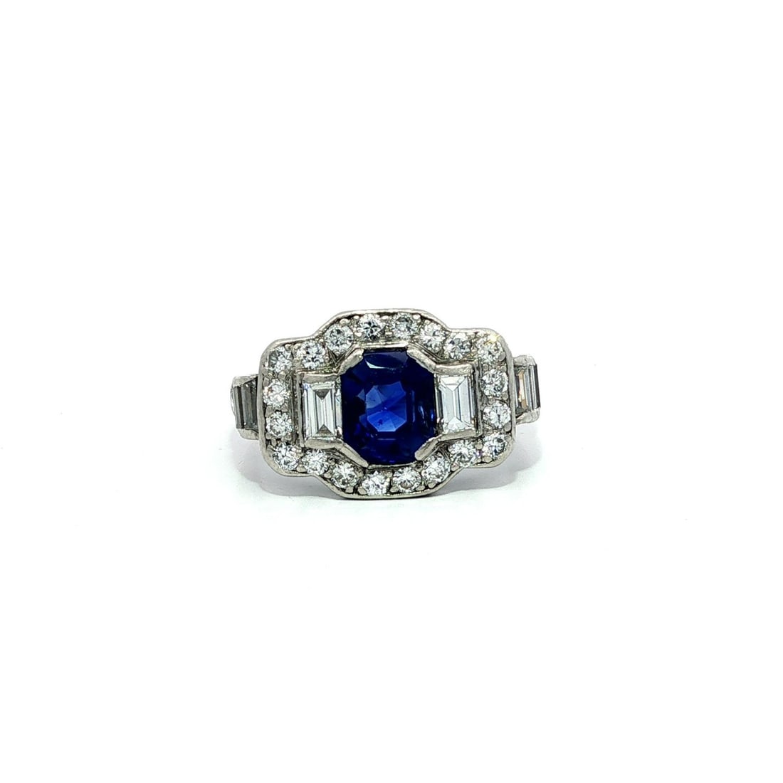 Tiffany & Co. Art Deco Platinum Royal Blue Sapphire Diamond Ring GIA Certified: Tiffany & Co. Art Deco Platinum Royal Blue Sapphire Diamond Ring GIA Certified This exquisite antique Art Deco ring from Tiffany & Co. showcases a stunning 1.35ct natural sapphire, certified as a roya