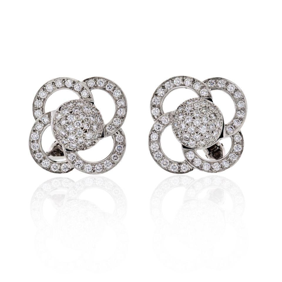 Elegant 18K White Gold 6 Carat Diamond Estate Clip Earrings: Elegant 18K White Gold 6 Carat Diamond Estate Clip Earrings These exquisite 18K White Gold clip earrings showcase a stunning total of 6 carats of diamonds, featuring 128 round brilliant cut stones wit