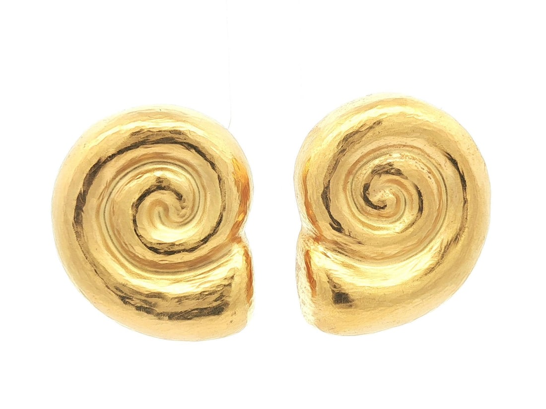 Greek 22K Yellow Gold Hammered Nautilus Shell Clip On Earrings: Greek 22K Yellow Gold Hammered Nautilus Shell Clip On Earrings Enhance your jewelry collection with these stunning Greek 22k Yellow Gold Puffed Nautilus Shell Hammered Matte Clip On Earrings. Expertly