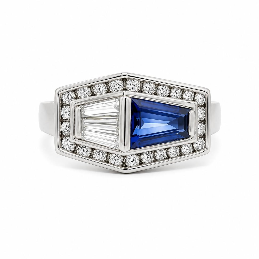 Platinum Cocktail Ring with Trapezoid Sapphire and Diamond Accents Size 6.5: Platinum Cocktail Ring with Trapezoid Sapphire and Diamond Accents Size 6.5 A pre-owned cocktail ring featuring a natural trapezoid-cut blue sapphire set east-west and accented by baguette and round d
