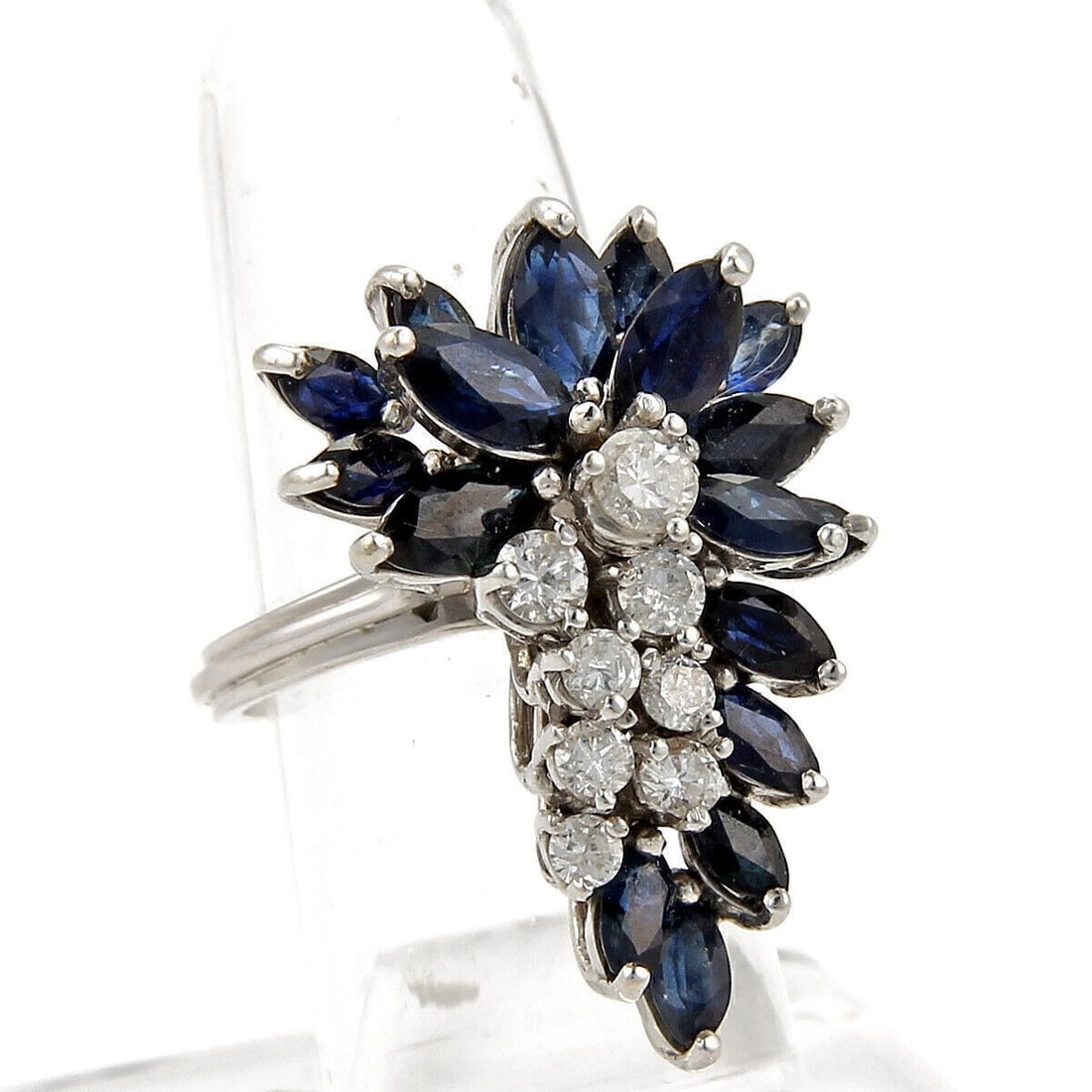 Vintage 14k White Gold Sapphire Diamond Cluster Ring Size 6: Vintage 14k White Gold Sapphire Diamond Cluster Ring Size 6 A vintage estate cluster ring crafted in 14k white gold, featuring diamonds and sapphires in an elongated design. The ring is size US 6 and 